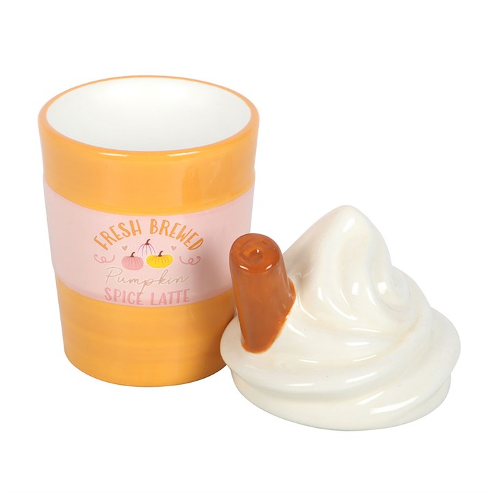 Spiced latte shaped wax melter and oil burner with a whipped cream shaped lid and cinnamon stick detailing.