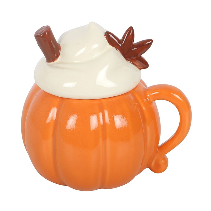 Pumpkin shaped mug with a whipped cream shaped lid, finished with cinnamon embellishment.