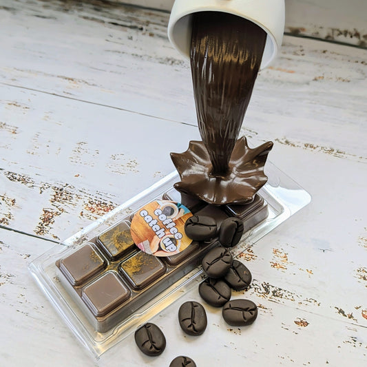 Coffee Catch Up coconut wax melt. Dark brown snap bar with golden accents. 
