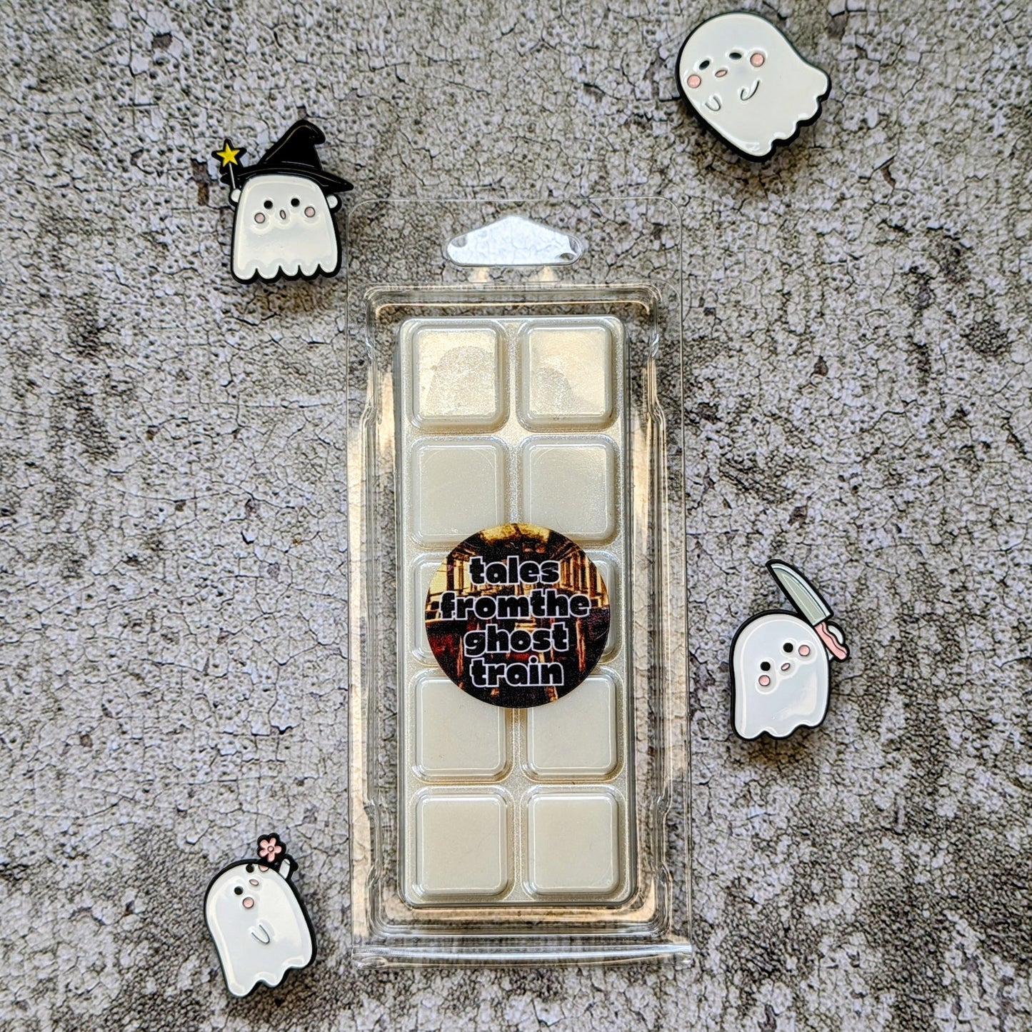 Tales from the Ghost Train coconut wax melt. White wax melt snap bar with white shimmer accents. 