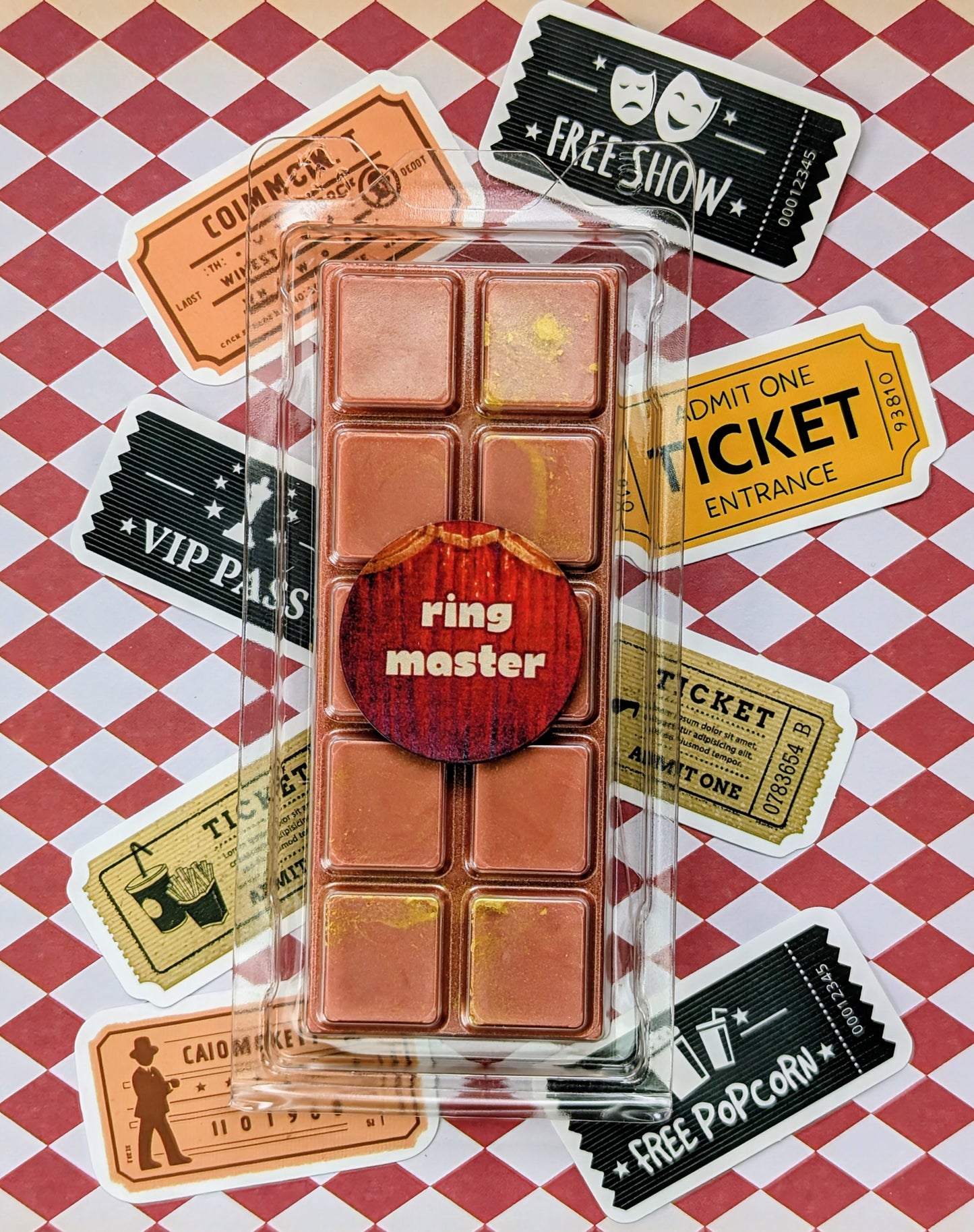 Ring Master coconut wax melt. Red wax melt snap bar with gold shimmer accents. 