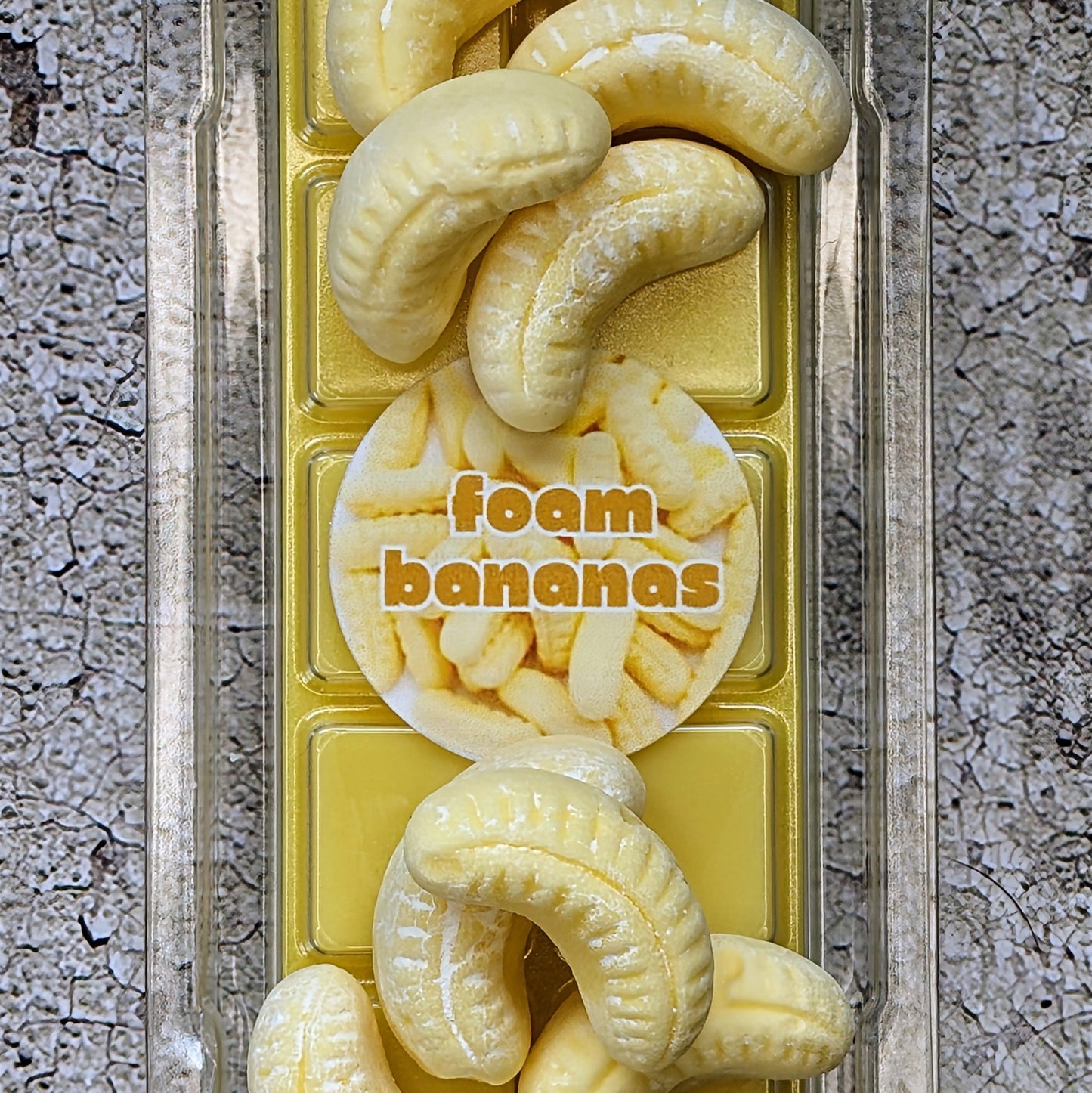 Foam Bananas coconut wax melt. Yellow snap bar with bright yellow shimmer accent. 