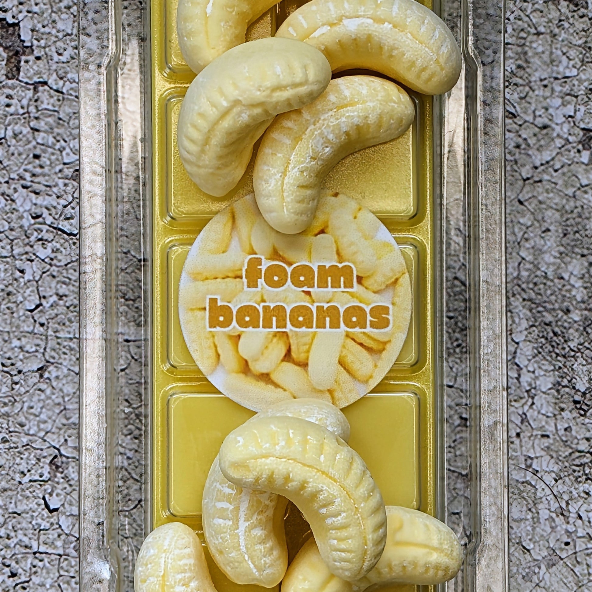 Foam Bananas coconut wax melt. Yellow snap bar with bright yellow shimmer accent. 