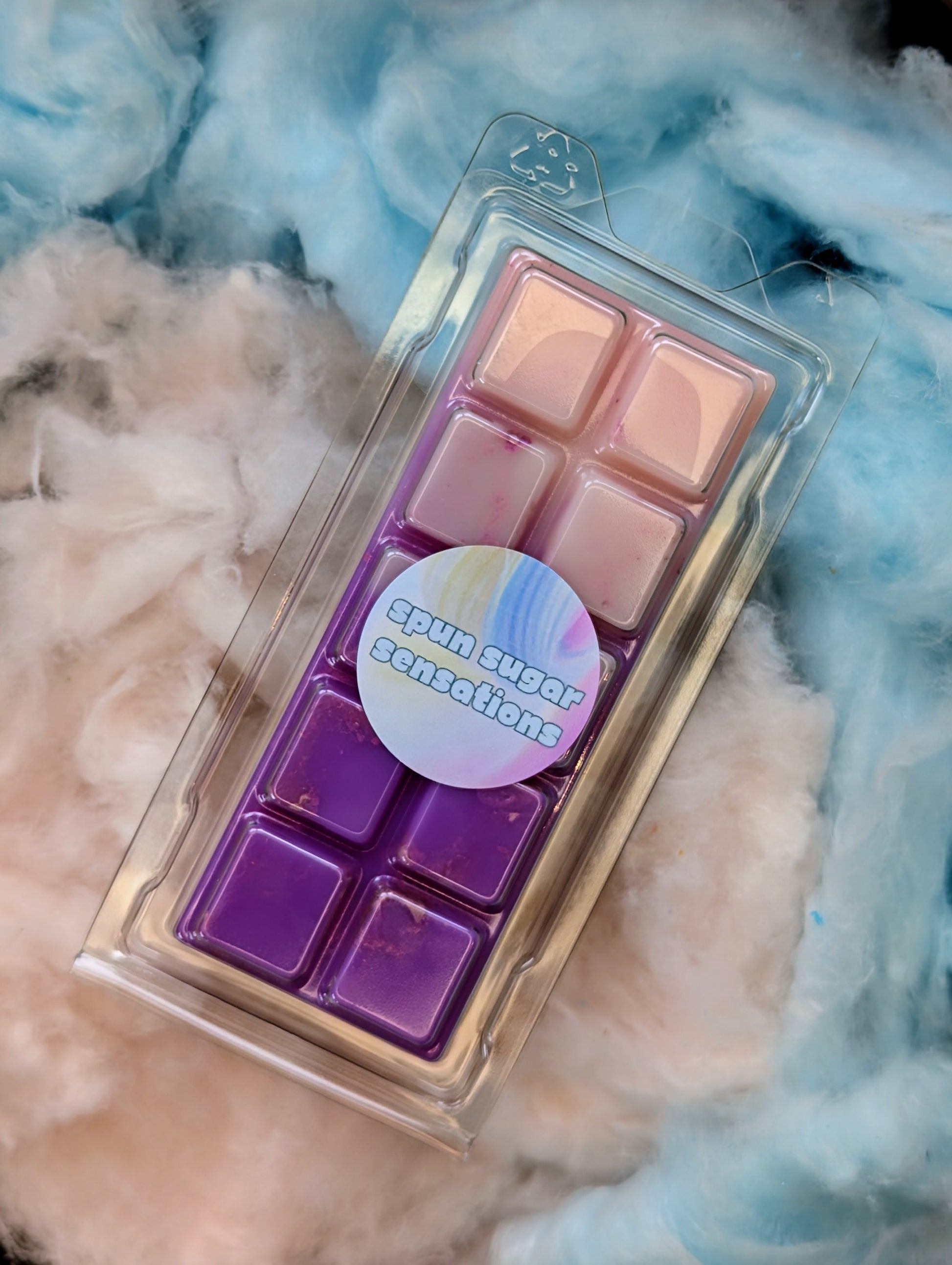 Spun Sugar Sensations coconut wax melt. Light pink and purple ombre snap bar with silver shimmer accents.