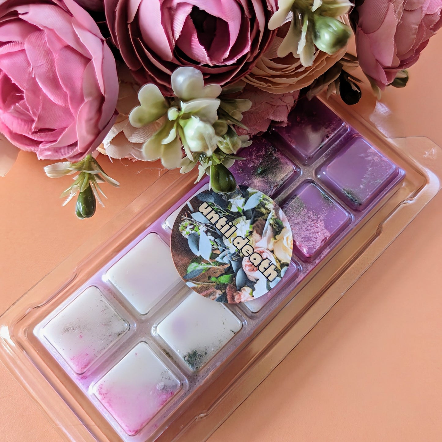 Until Death coconut wax melt. Purple and white ombre snap bar with shimmer and green glitter accents.