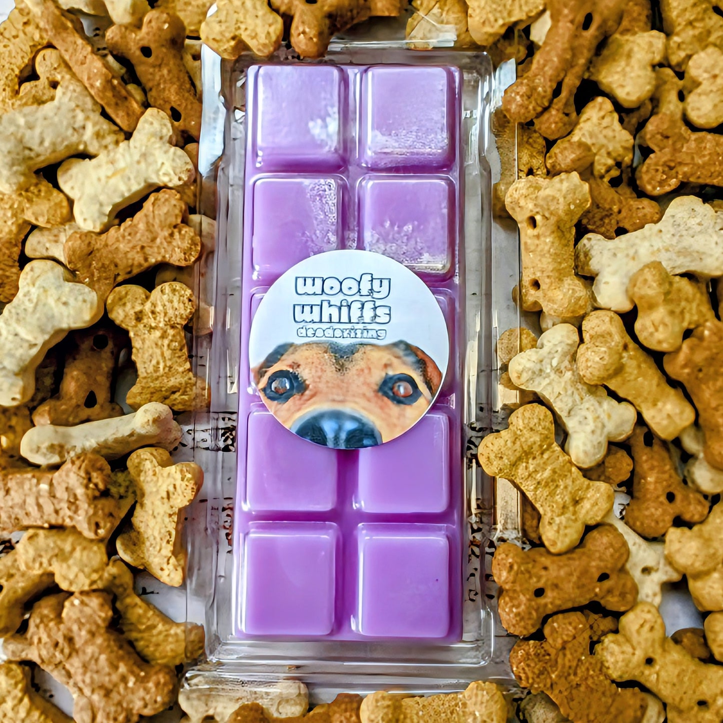 Woofy Whiffs odour eliminating coconut wax melt. Light purple snap bar with silver shimmer accents.