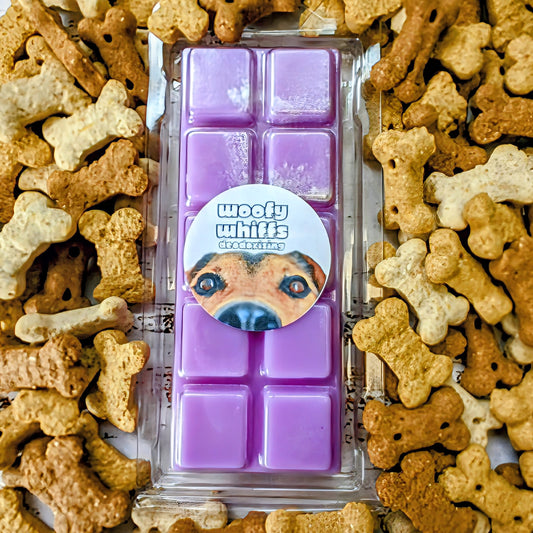 Woofy Whiffs odour eliminating coconut wax melt. Light purple snap bar with silver shimmer accents.