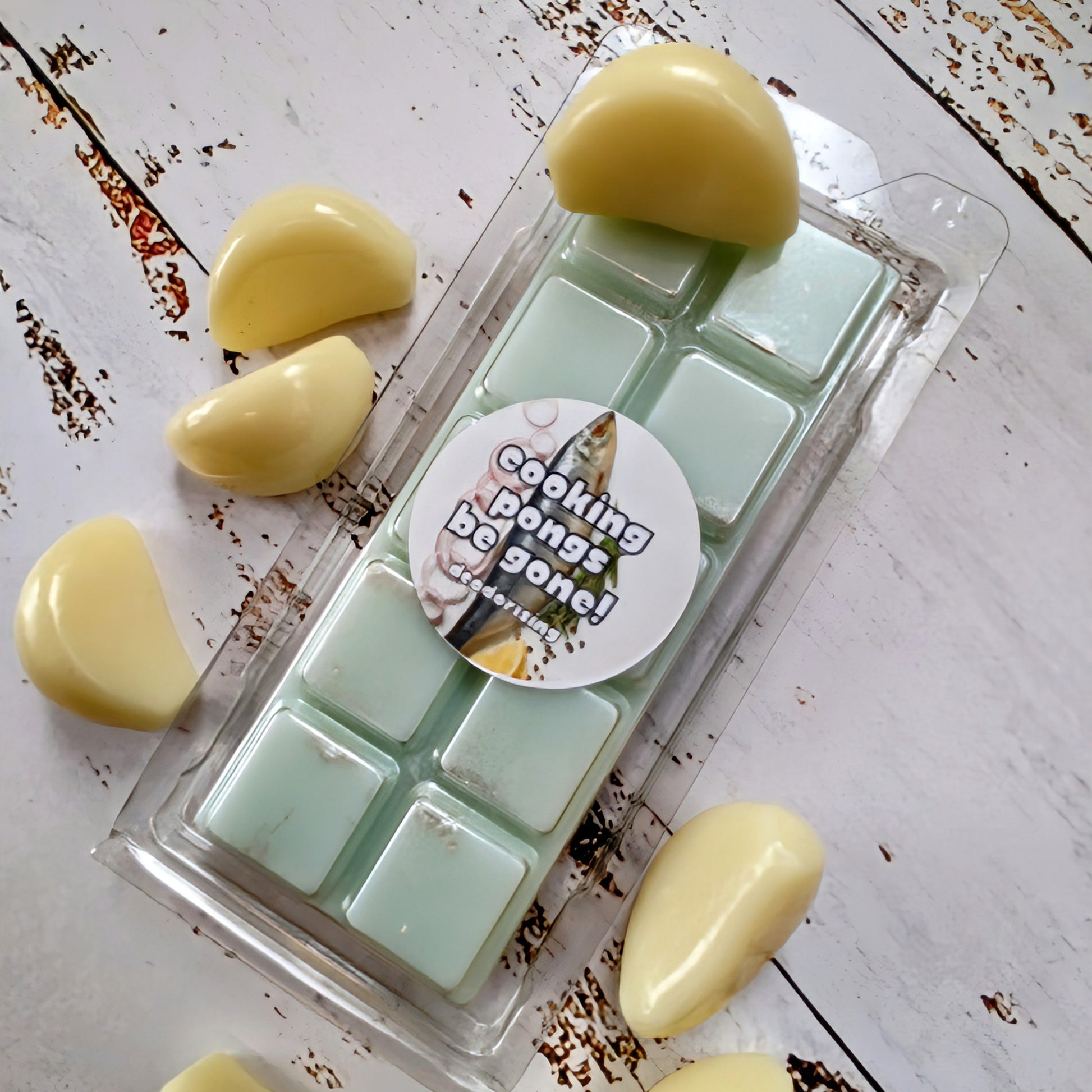 Cooking Pongs Begone! deodorising coconut wax melt. Light green snap bar with silver shimmer accents. 