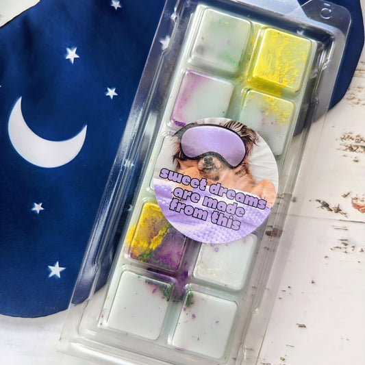 Sweet Dreams Are Made From This coconut wax melt. Light blue snap bar with purple, green and yellow shimmer accents.