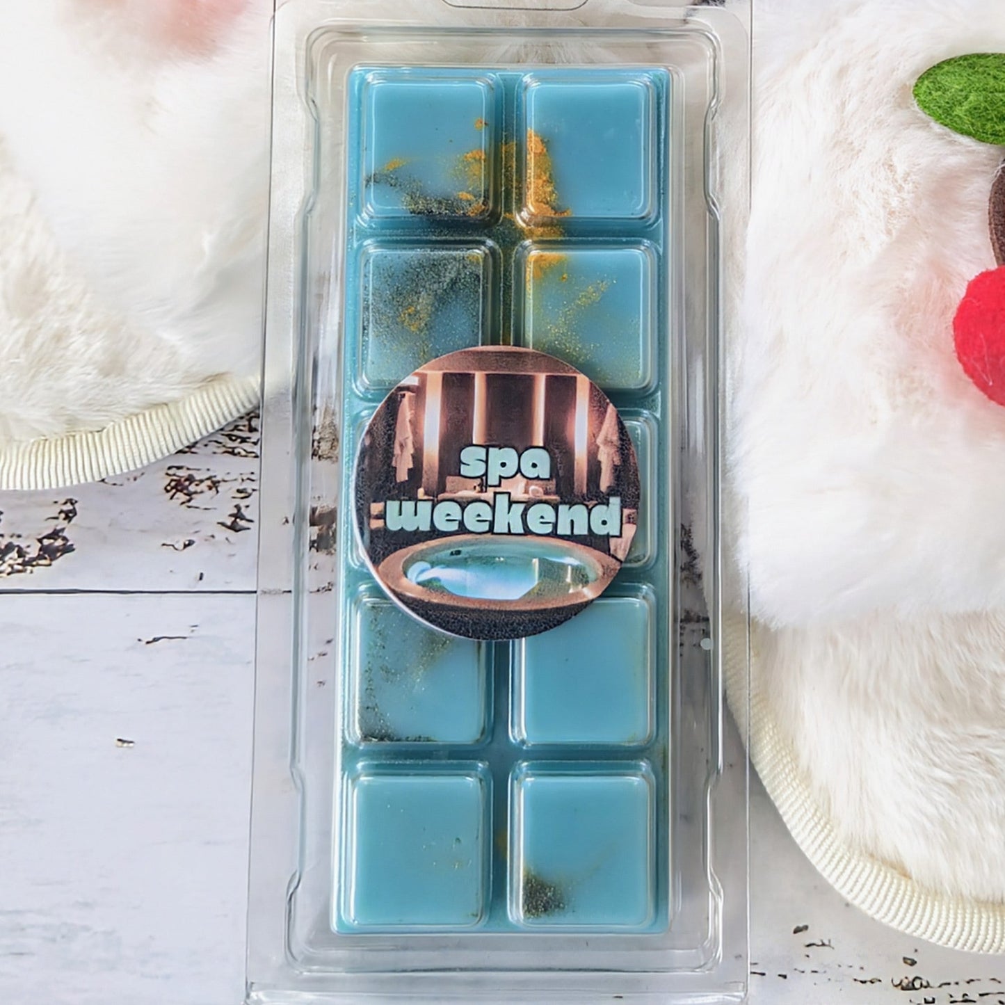 Spa Weekend coconut wax melt. Turquoise snap bar with golden and gun-metal grey shimmer accents. 