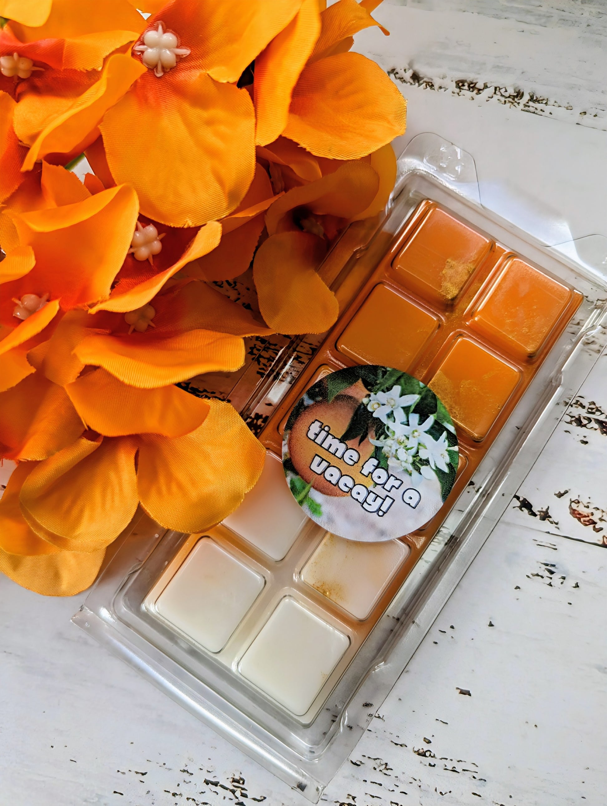 Time for a Vacay! coconut wax melt. Orange and cream ombre snap bar with gold shimmer accents. 