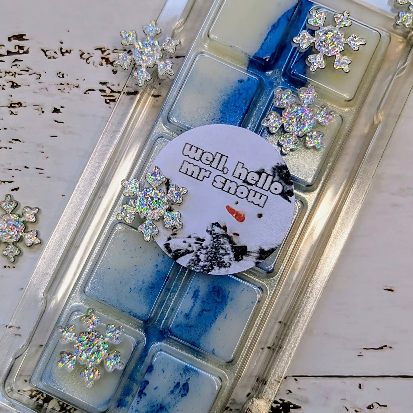 Well, Hello Mr Snow coconut wax melt. White snap bar with deep blue shimmer accents. 