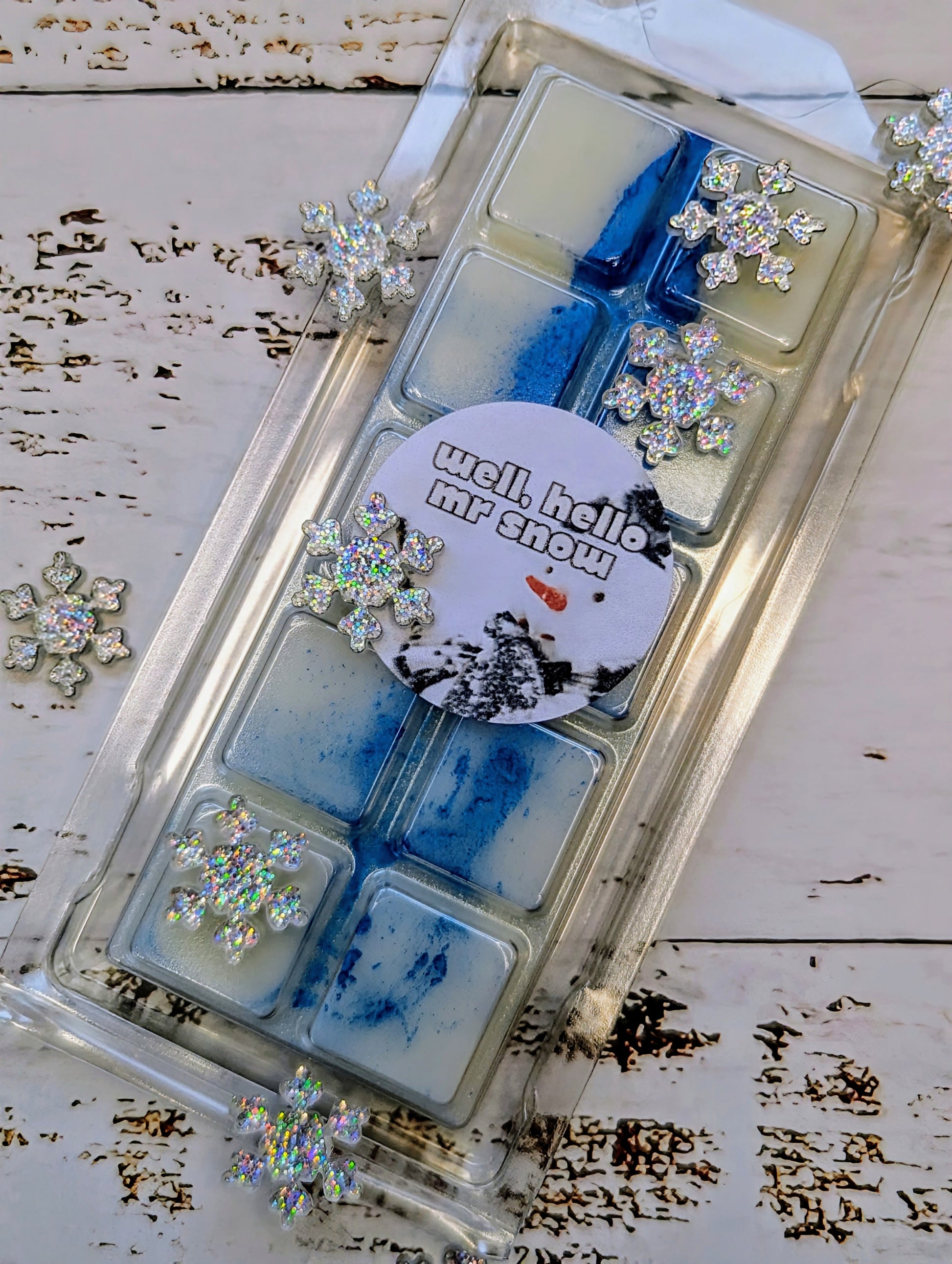 Well, Hello Mr Snow coconut wax melt. White snap bar with deep blue shimmer accents. 