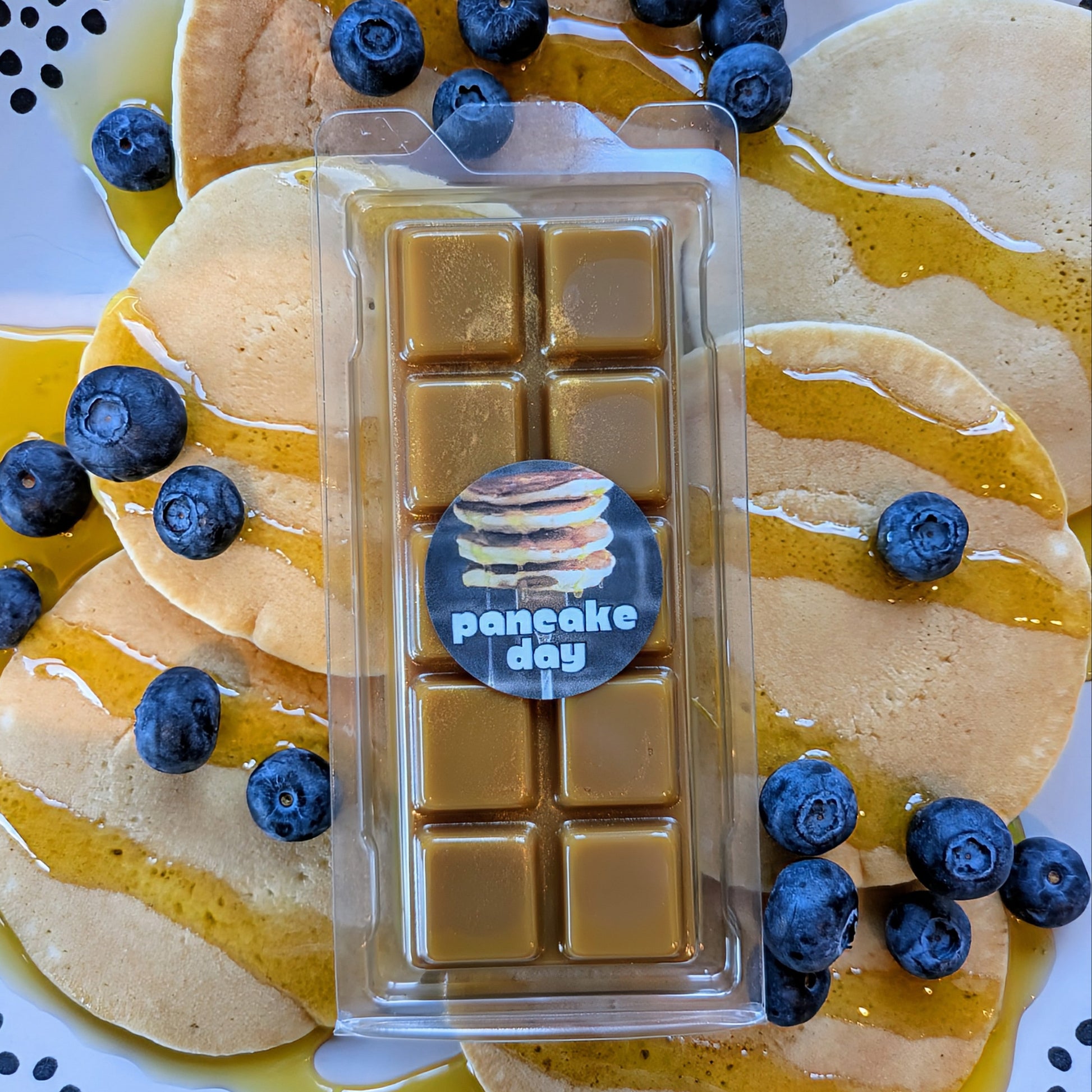 Pancake Day coconut wax melt. Light brown snap bar with gold shimmer accents.