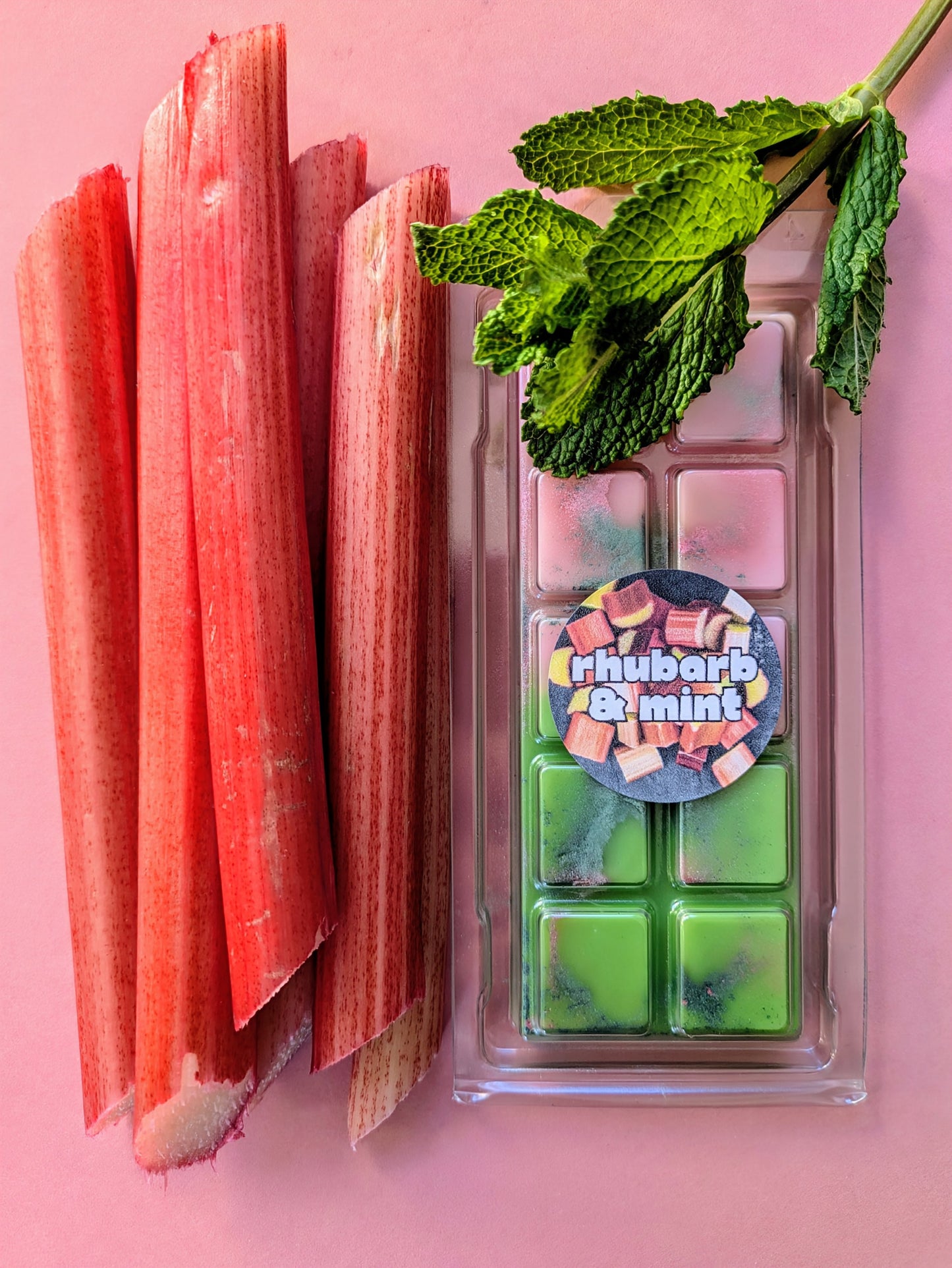 Rhubarb and Mint coconut wax melt. Pink and green ombre snap bar with dark green and pink shimmer accents. 