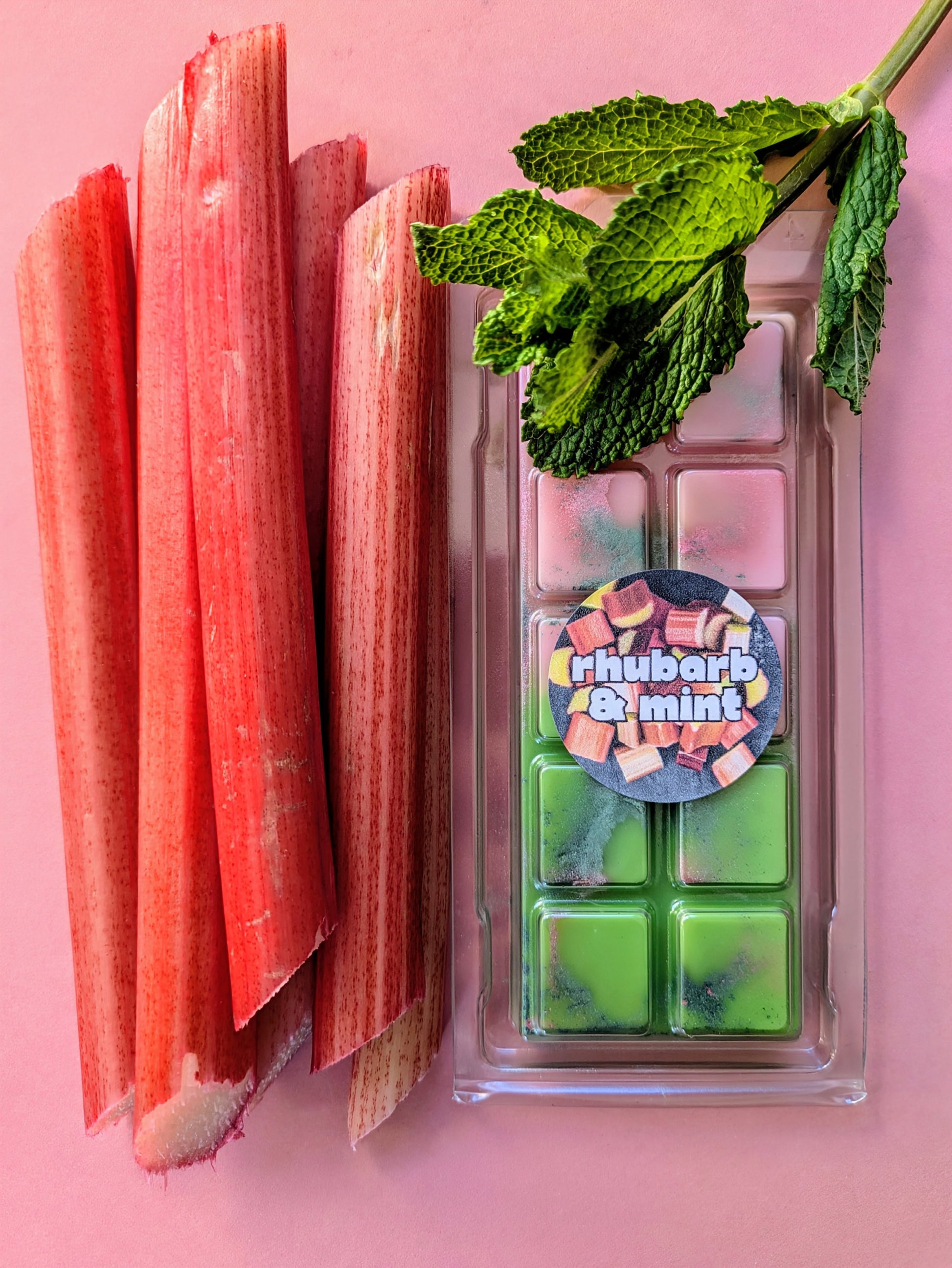 Rhubarb and Mint coconut wax melt. Pink and green ombre snap bar with dark green and pink shimmer accents. 