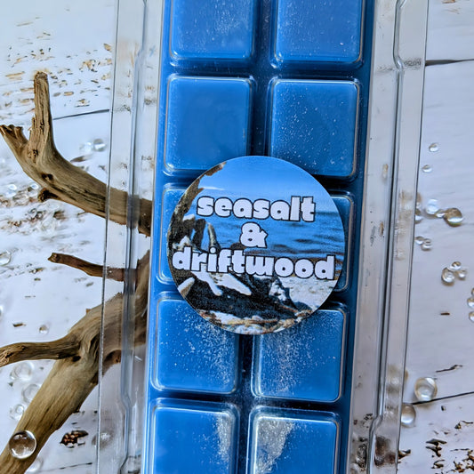 Seasalt and Driftwood coconut wax melt. Deep blue snap bar with silver shimmer accents.