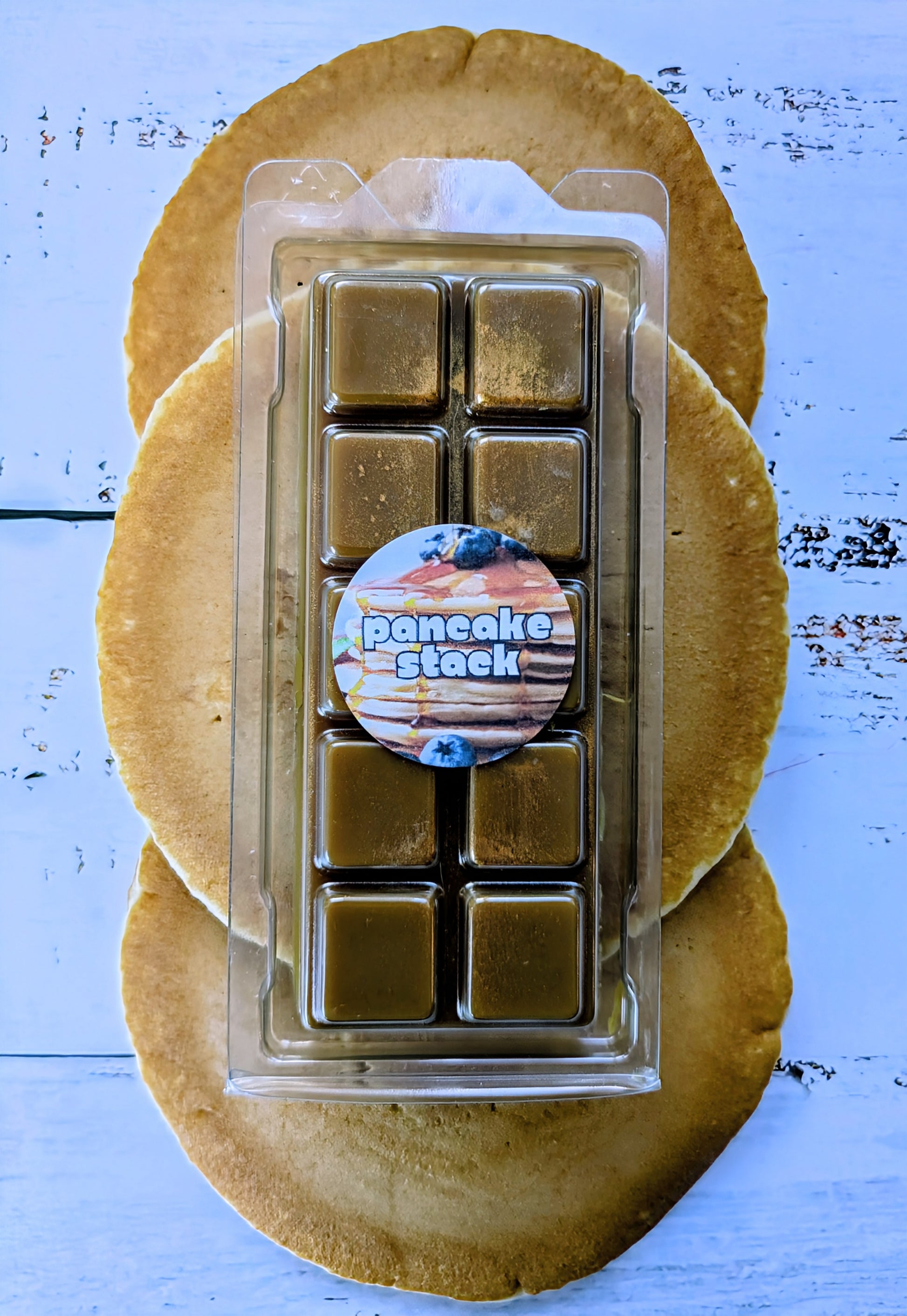 Pancake Stack coconut wax melt. Dark brown snap bar with gold shimmer accents.