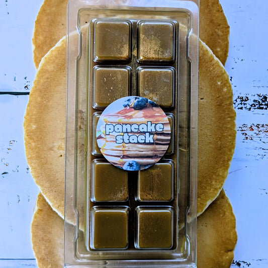 Pancake Stack coconut wax melt. Dark brown snap bar with gold shimmer accents.