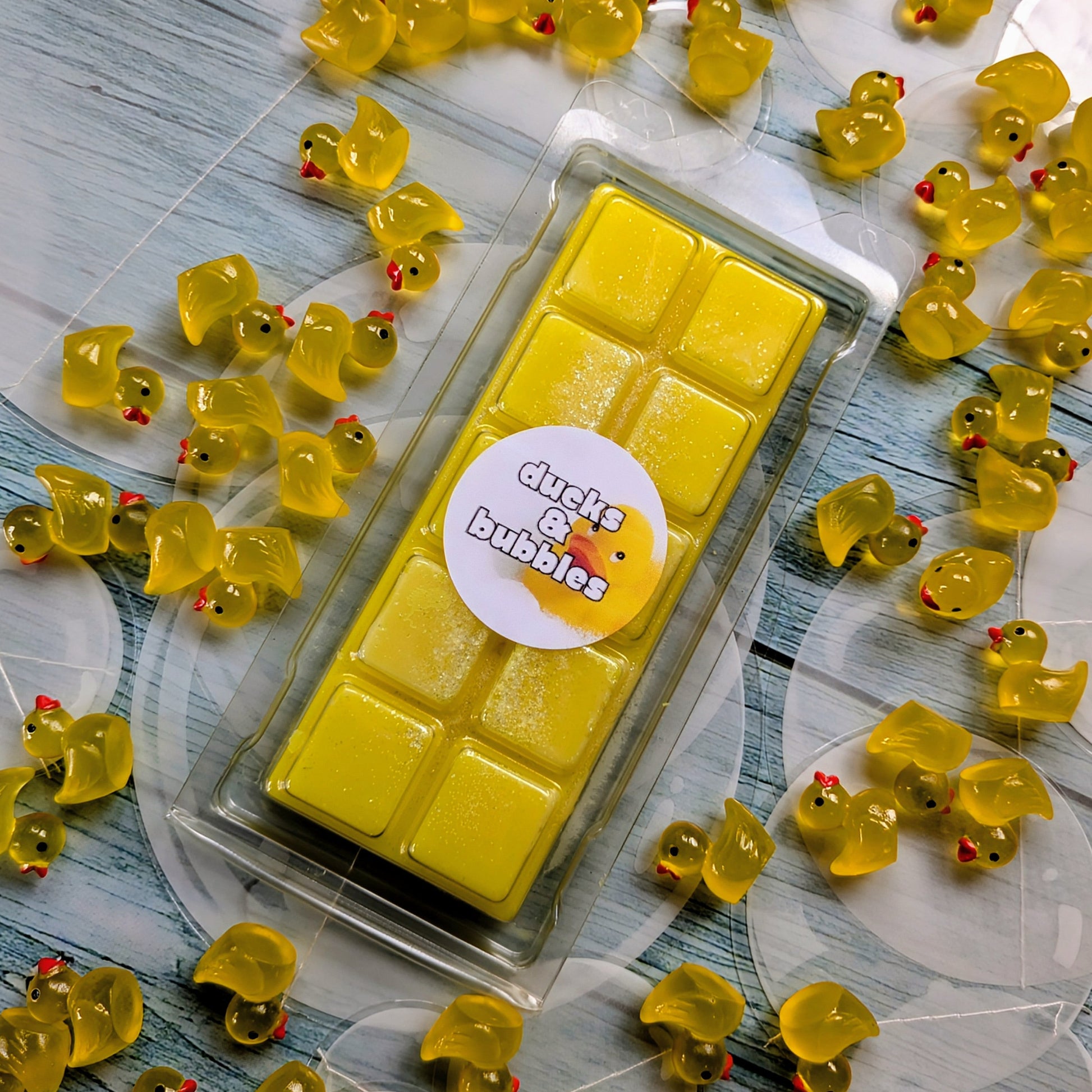 Ducks & Bubbles coconut wax melt. Bright yellow snap bar with white shimmer accents. 