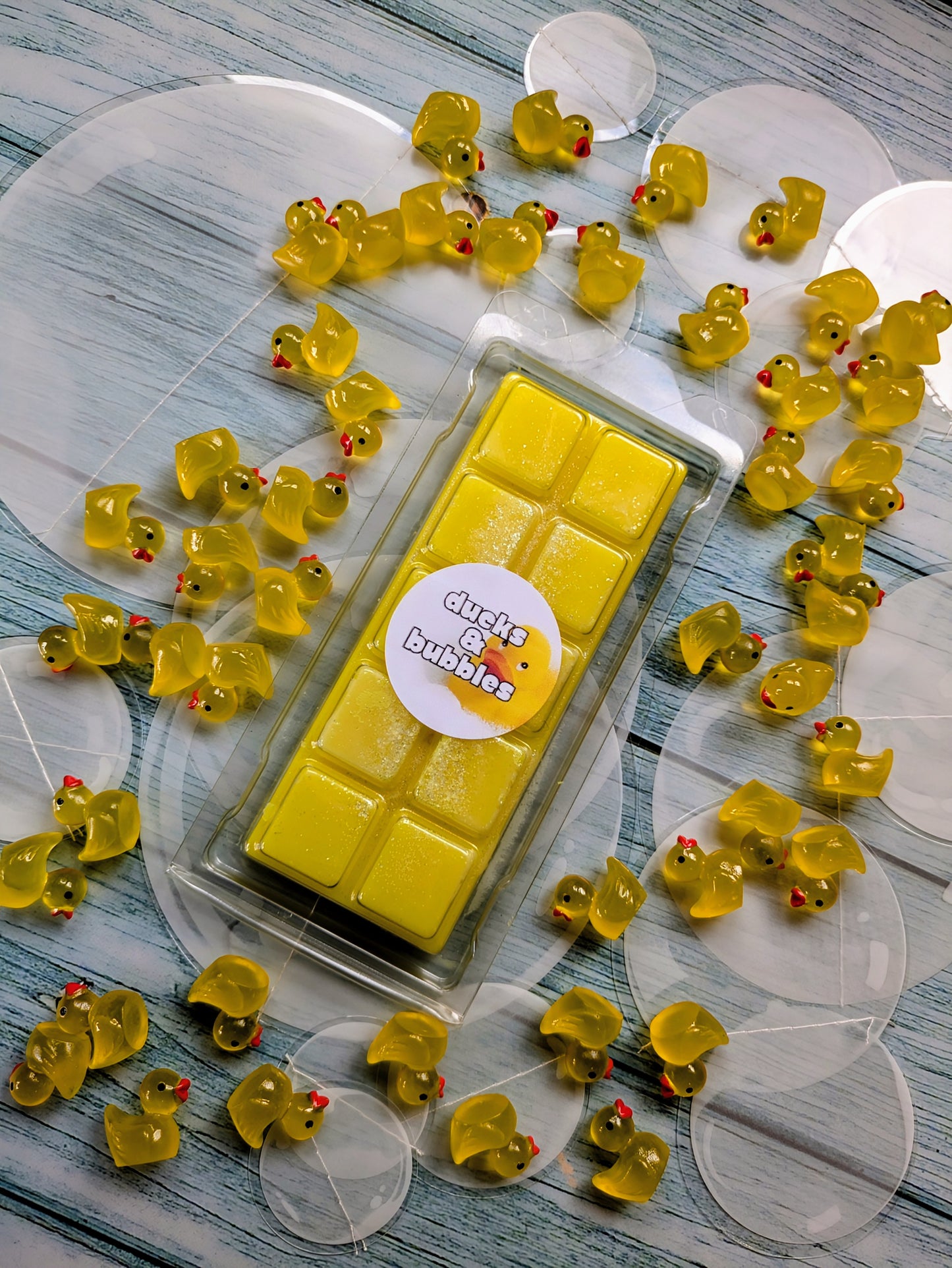 Ducks & Bubbles coconut wax melt. Bright yellow snap bar with white shimmer accents. 