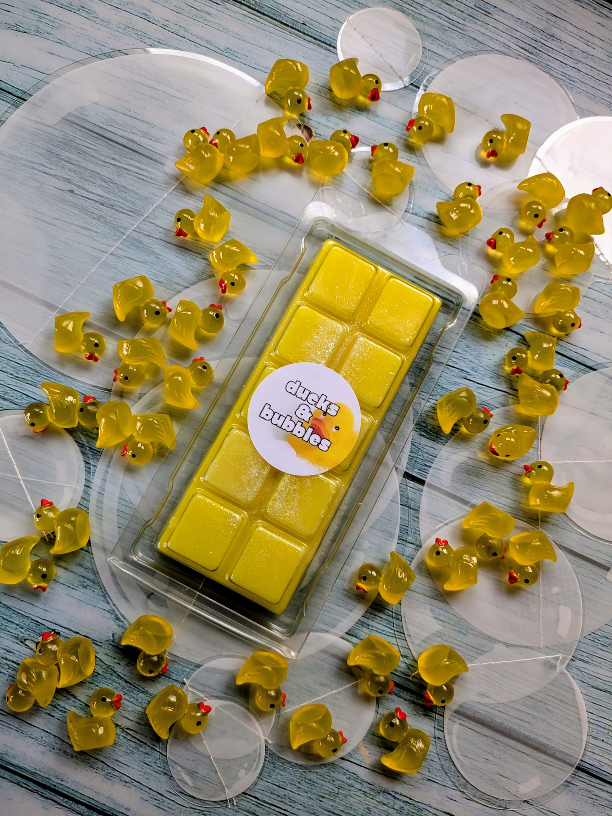 Ducks & Bubbles coconut wax melt. Bright yellow snap bar with white shimmer accents. 