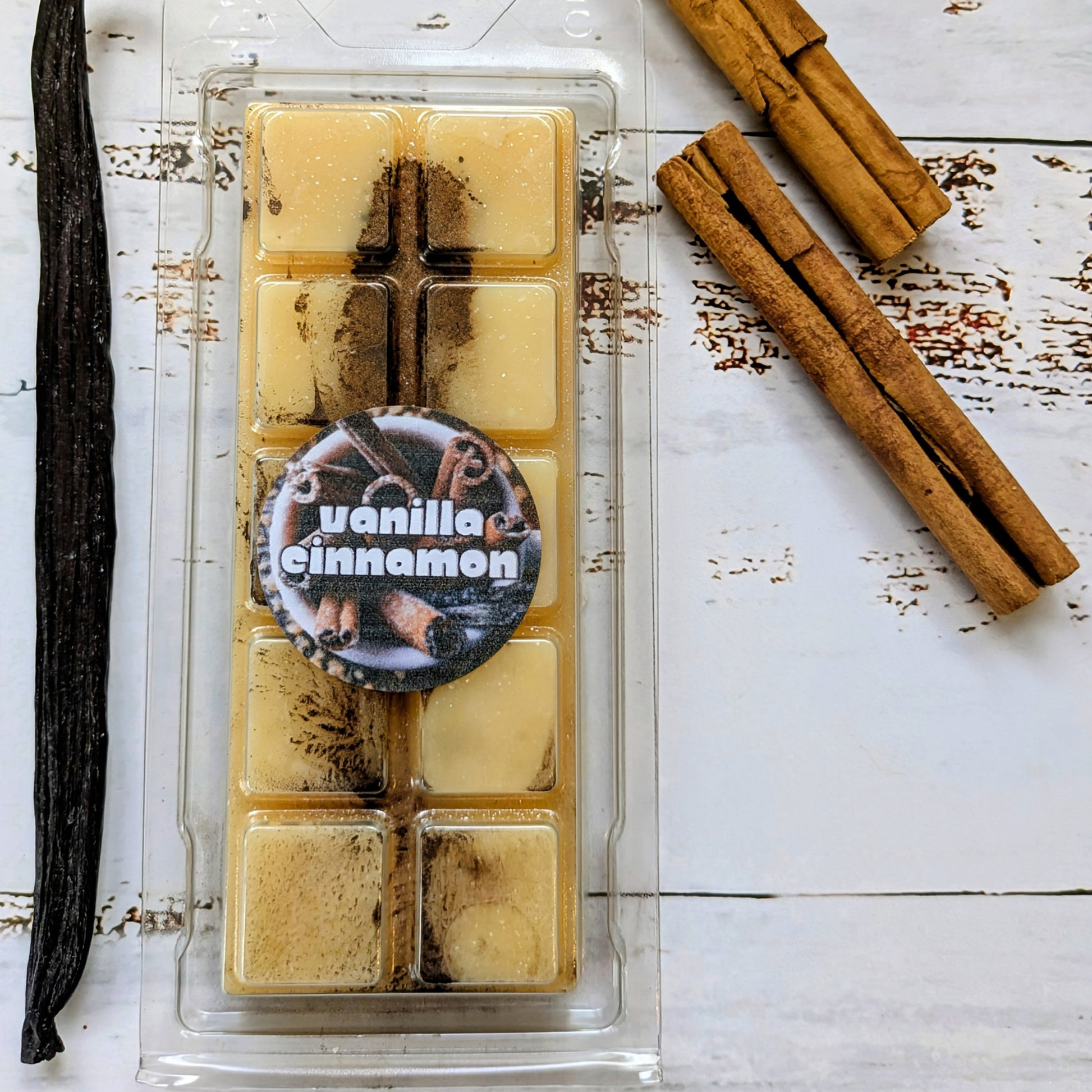 Vanilla Cinnamon coconut wax melt. Cream snap bar with bronze and brown shimmer accents. 