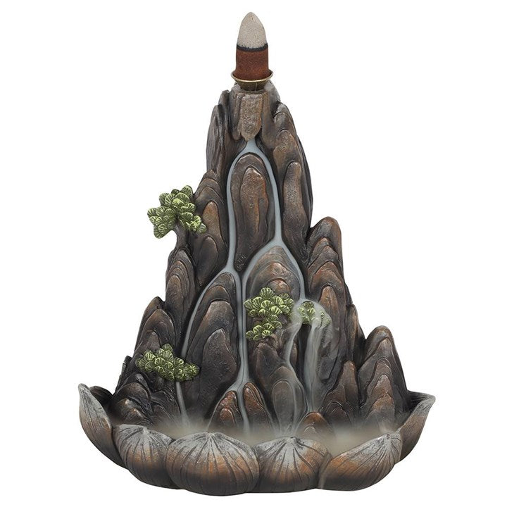Mountain shaped backflow incense cone burner, with bonsai tree accents. Smoke rolls downwards in a waterfall effect. 