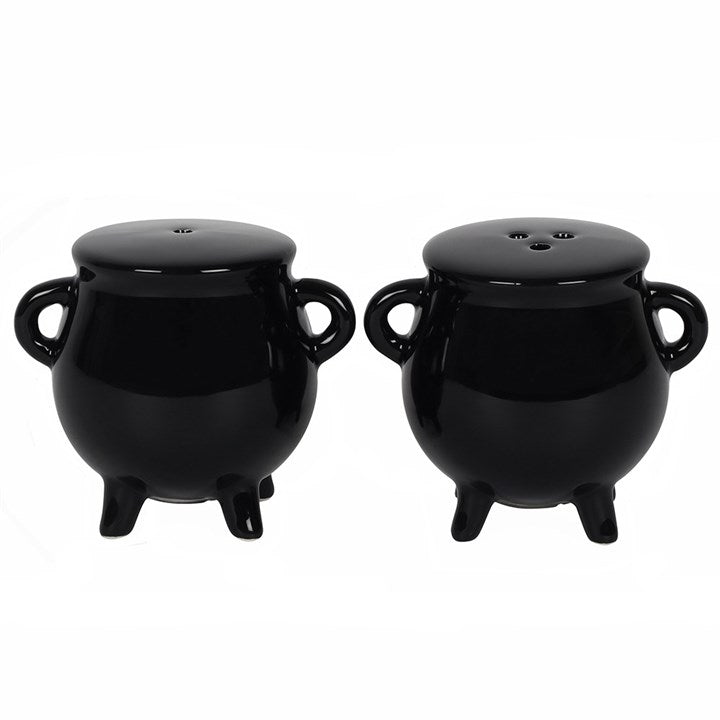 Two black cauldron-shaped salt and pepper shakers. 