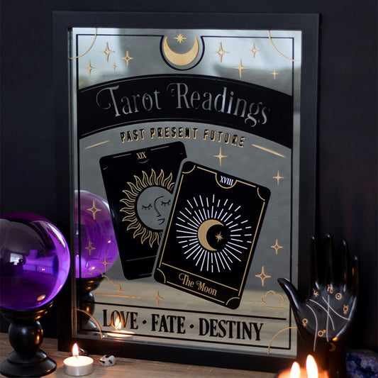 Decorative mirror hanging with Tarot Readings text, tarot card details and celestial accents. 