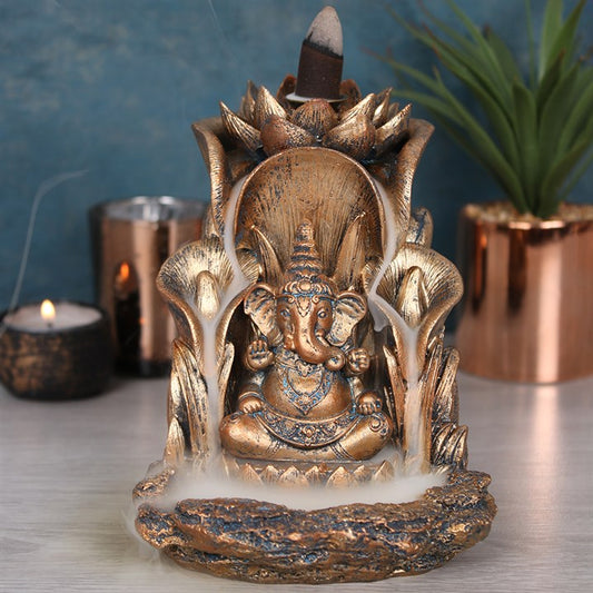 Ganesh and lotus leaf backflow incense cone burner, with a bronze effect finish.