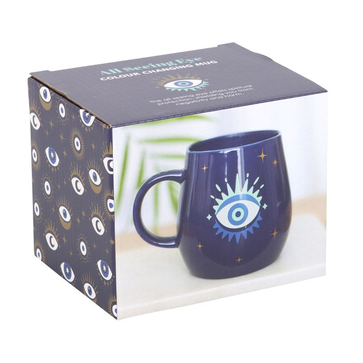 All Seeing Eye heat-changing ceramic mug. Design changes from a closed eye to an open eye when the mug is hot. Presented in a themed box.