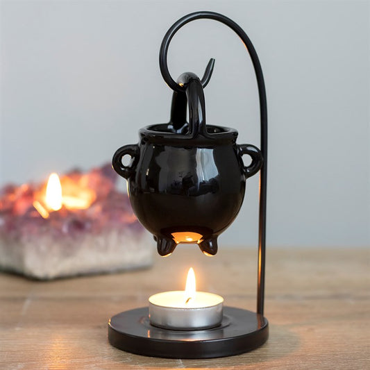 Hanging cauldron wax melter and oil burner. 