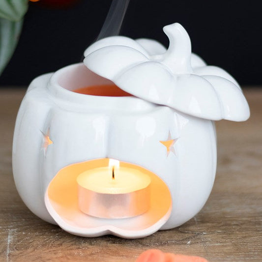 White ceramic pumpkin shaped wax melter and oil burner.