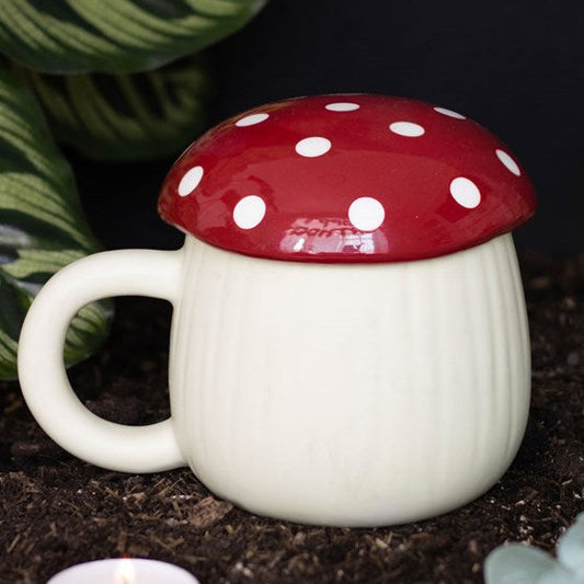 Ceramic lidded mug shaped like a fly agaric mushroom. 