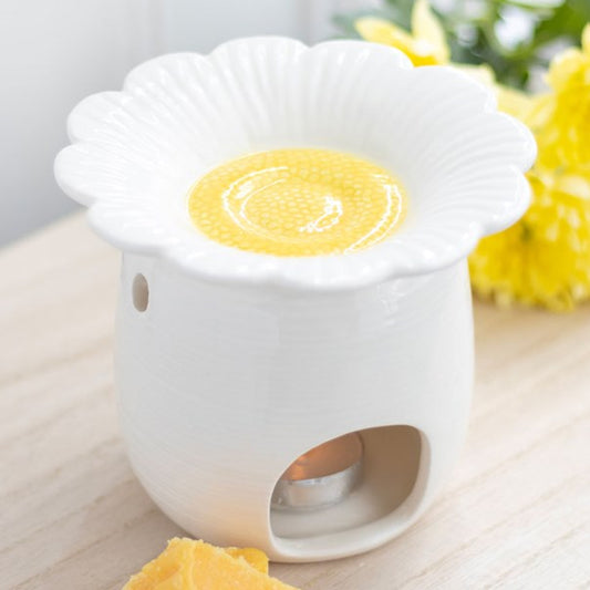 Ceramic daisy shaped wax melter and oil burner.