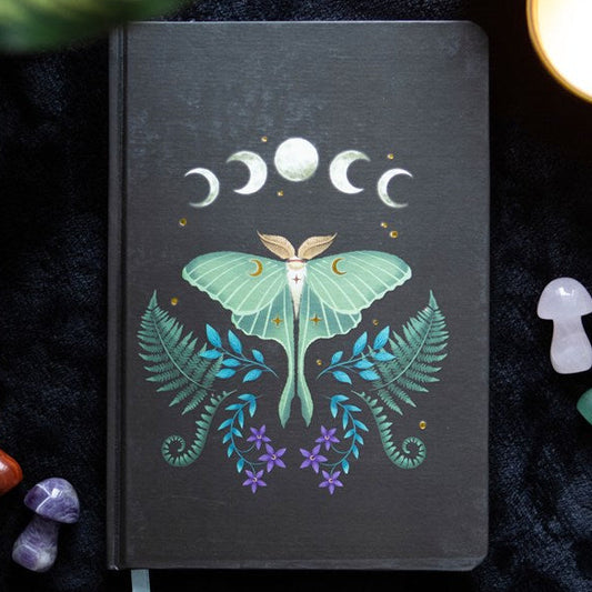 A5 lined notebook with a celestial inspired design - incl. phases of the moon, luna moth and vintage fauna.