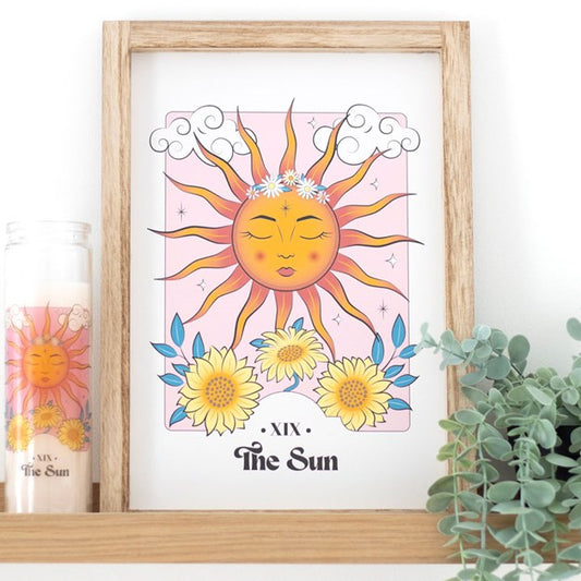 Framed artwork of The Sun tarot card. Bright and colourful illustration in a wooden frame.