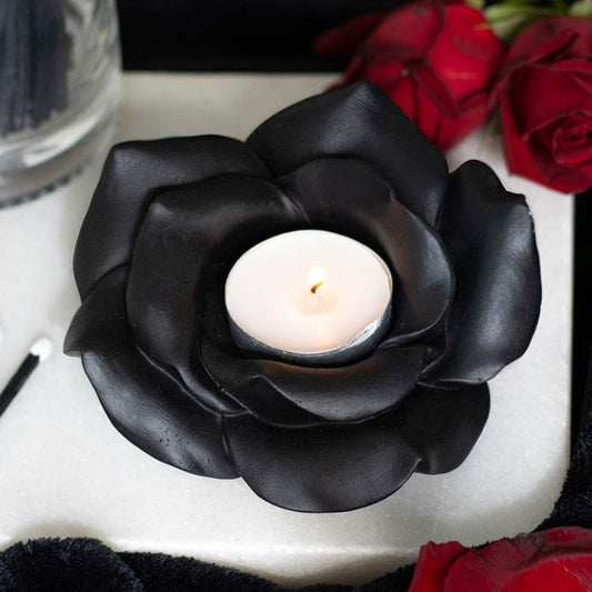 Resin tealight holder shaped like a dark rose in full bloom. 