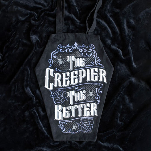 Black coffin-shaped tote bag with The Creepier The Better text.