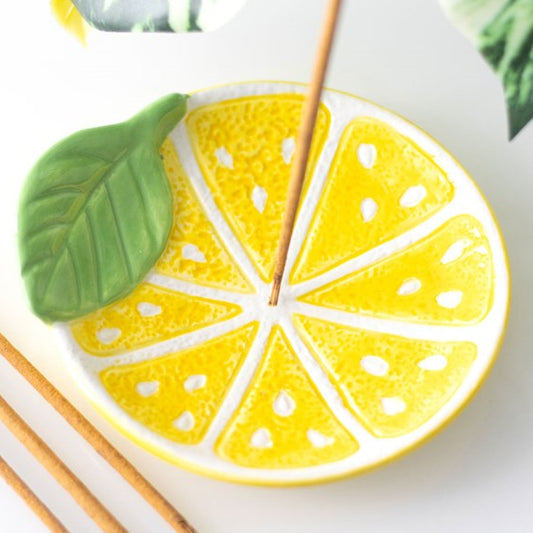 Ceramic lemon slice incense dish for use with incense sticks and cones.