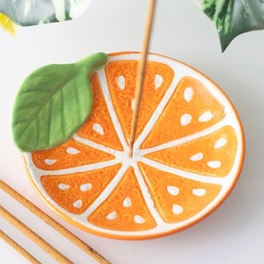 Ceramic orange slice incense dish for sticks and cones. 