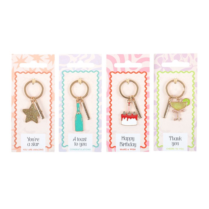 Set of 24 enamel party-icon keyrings. Champagne bottle, cocktail glass, star and birthday cake. 