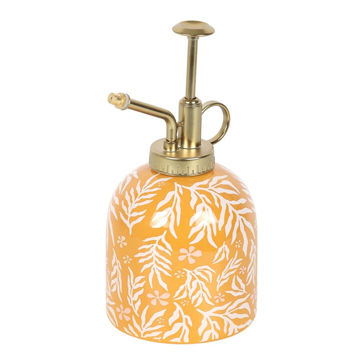 Ceramic yellow plant mister with a white leaf motif and silver-effect spray pump.