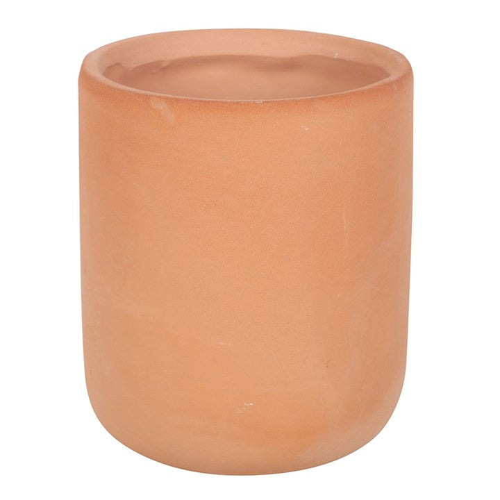 Terracotta plant pot with charming embossed sunburst design. Reverse view.