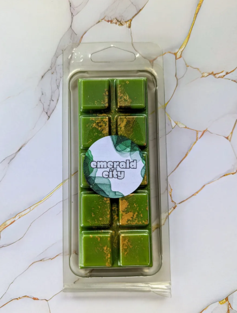 Emerald City coconut wax melt. Olive green snap bar with gold shimmer accents.