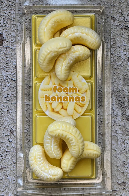Foam Bananas coconut wax melt. Yellow snap bar with yellow shimmer accents. 