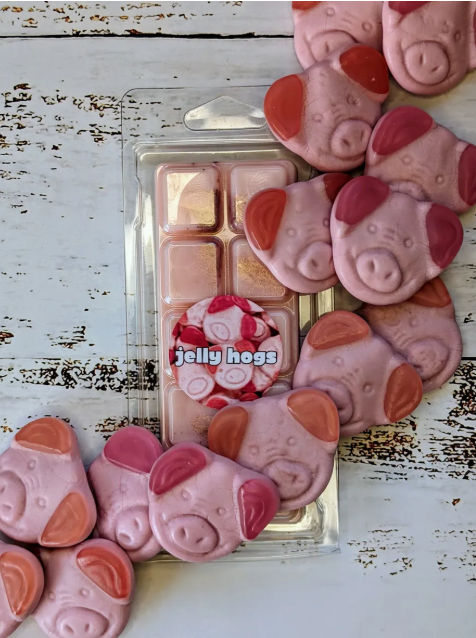 Jelly Hogs coconut wax melt. Light pink snap bar with golden shimmer accents. 