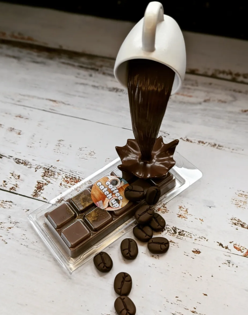 Coffee Catch Up coconut wax melt. Dark brown snap bar with golden accents. 