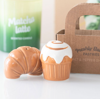 Ceramic croissant and cinnamon roll salt and pepper shaker set.